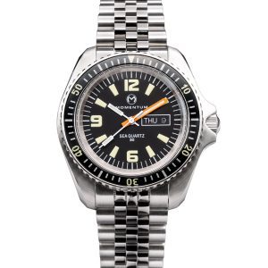 This image portrays The Momentum Sea Quartz 30 "Magnum PI" Dive Watch by Scuba Show | May 31 & June 1, 2025.
